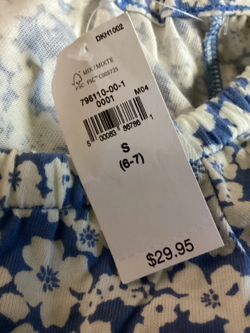 A blue and white floral Gap Kids romper size 6-7